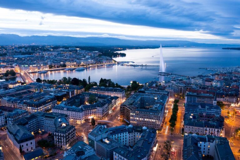 Geneva, Switzerland - Jet d'Eau and Lake Geneva with Alpine Backdrop