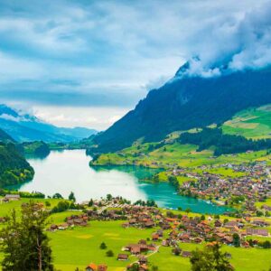 Interlaken: A breathtaking Swiss town nestled between two stunning lakes, offering panoramic views of the Alps and a gateway to adventure.