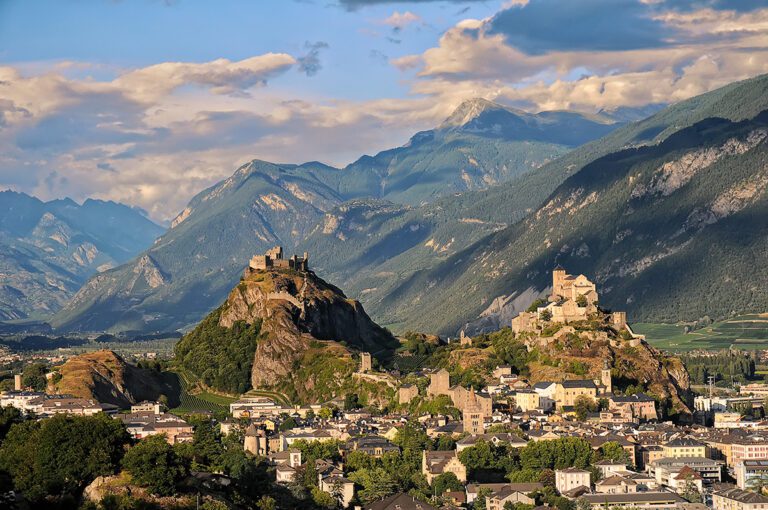 Sion: A historic town in the Swiss Alps, known for its ancient castles, vineyards, and charming old town.