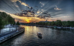 Paris - The City of Light: A mesmerizing view of the iconic cityscape, showcasing the romantic charm and illuminated beauty that define Paris.