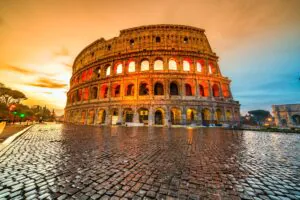 Colosseum: A majestic ancient amphitheater in the heart of Rome, Italy, known for its grandeur, history, and iconic architecture that once hosted gladiatorial contests and public spectacles.